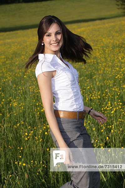 Woman  22 years  in a spring meadow