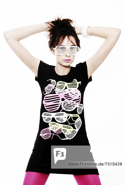 Woman  24  posing with a cool pair of glasses and a t-shirt