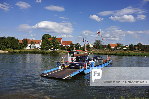 Wipfeld ferry with passengers on the Main river  behind the Fahr village  Wipfeld  Lower Franconia  Bavaria  Germany  Europe