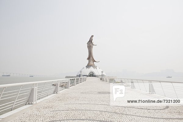 Statue by the ocean  Macau  China