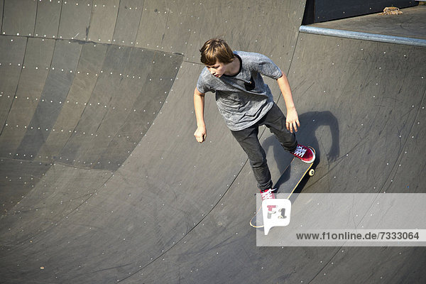 Twelve-year-old skater  Lohserampe ramp  a skateboard park in Cologne  North Rhine-Westphalia  Germany  Europe  PublicGround