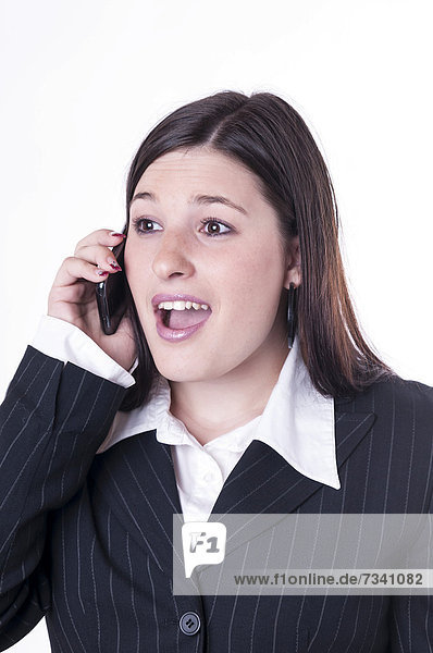 Geschäftsfrau beim Telefonieren  erfreut