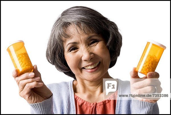 Senior  Senioren  Frau  halten  Pille