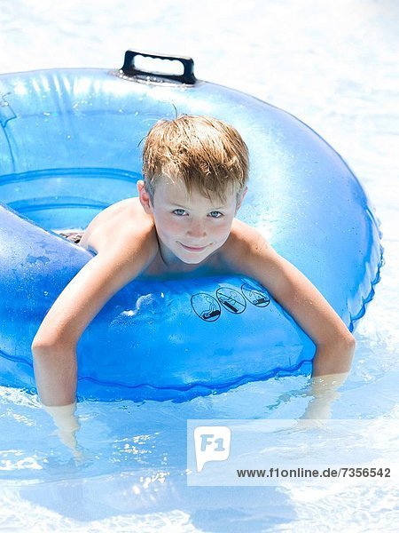 boy in an inner tube