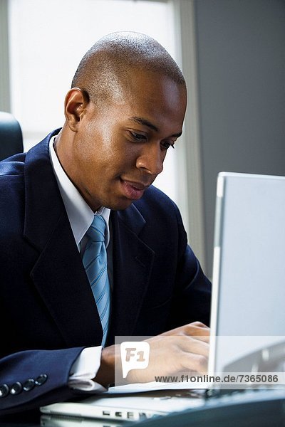 Businessman working on a laptop computer
