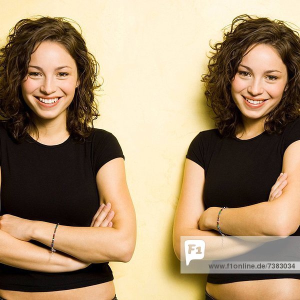 Identical twin teenage girls