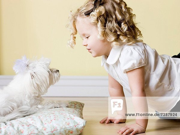 little girl with dog