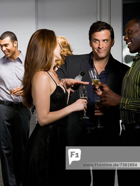 Partygoers socializing