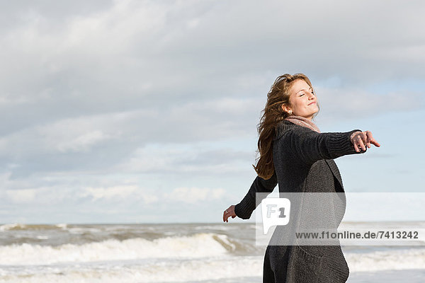 Woman playing on beach