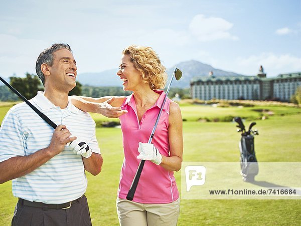 sprechen  Fröhlichkeit  Golfsport  Golf  Kurs