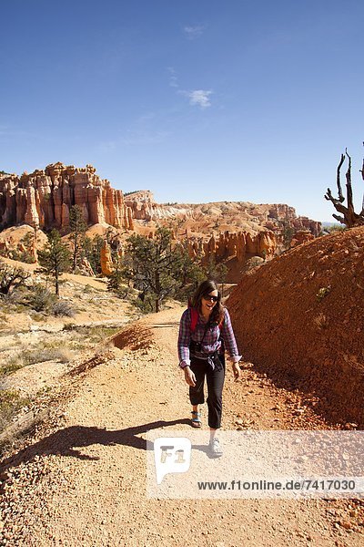 Young woman hiking in Bryce Canyon National Park.