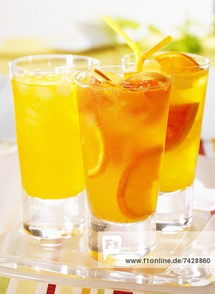 Three tangerine and grapefruit drinks