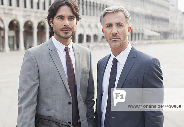 Portrait of confident businessmen in St. Mark's Square in Venice