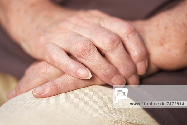 Close up of older woman's hands