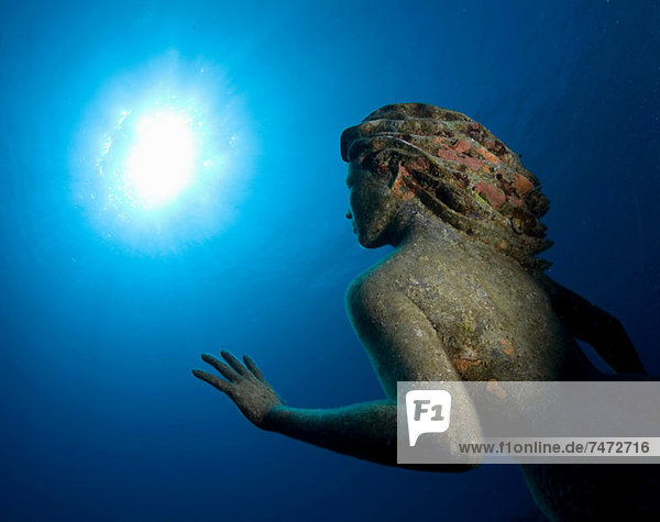 Sunken statue underwater