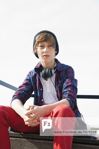 Portrait of Boy wearing Toque and Headphones Outdoors  Mannheim  Baden-Wurttemberg  Germany