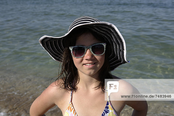 Girl  12 years  on a beach  portrait
