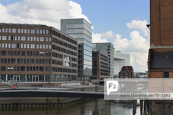 Modern office buildings at Brooktorhafen harbour with Museumsbruecke bridge