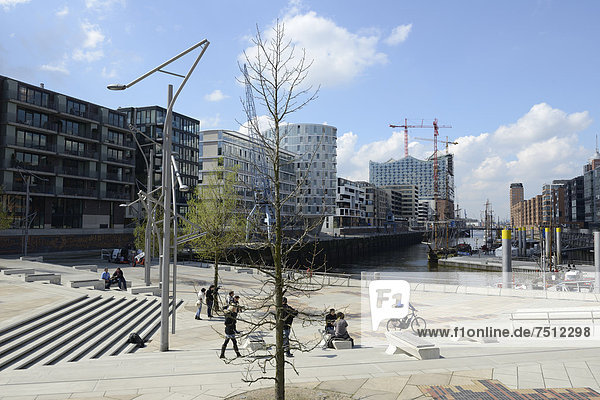 Magellan Terraces  modern residential and office buildings  Elbe Philharmonic Hall under construction at back  Sandtorhafen harbour  Sandtorkai and Kaiserkai streets