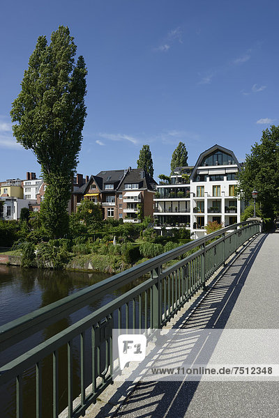 Residential houses  bridge across the Alster river  Leinpfad walkway  Alster river  Goernebruecke bridge