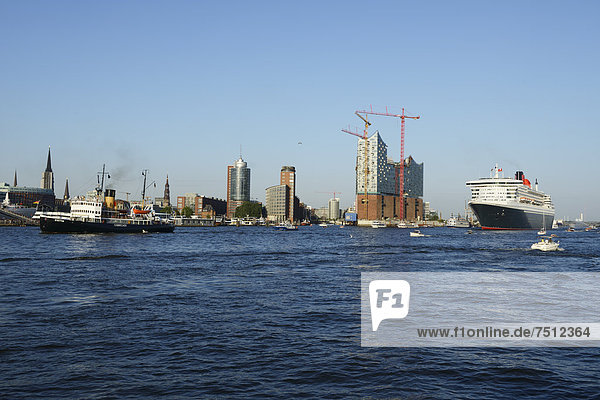 'Cruise liner RMS Queen Mary 2 leaving the harbour  steam icebreaker ''Stettin''  left  Hamburg Cruise Days  Port of Hamburg with the Elbe Philharmonic Hall under construction at back'