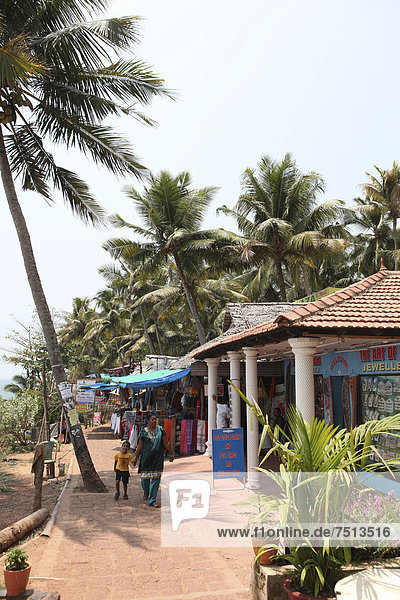 Restaurants and shops under palm trees  Varkala Beach  Kerala  India  Asia