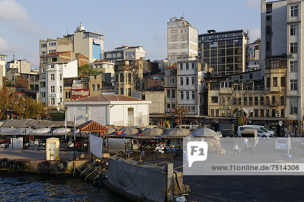Decrepit houses and a market in Karakoey  Golden Horn  Istanbul  Turkey  Europe  PublicGround