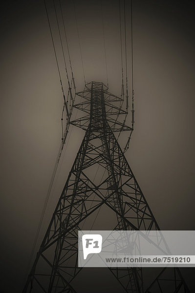 Power pylon in fog