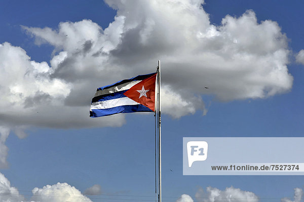 The Cuban flag blowing in the wind  Cuba  Greater Antilles  Central America  America