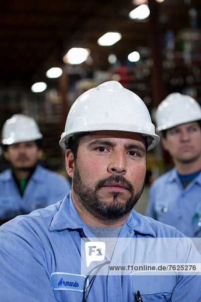 Close up of worker in metal plant
