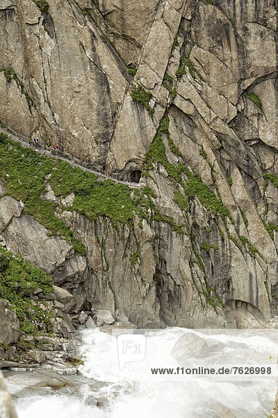 Rock face and river in the Alps  Andermatt  Switzerland