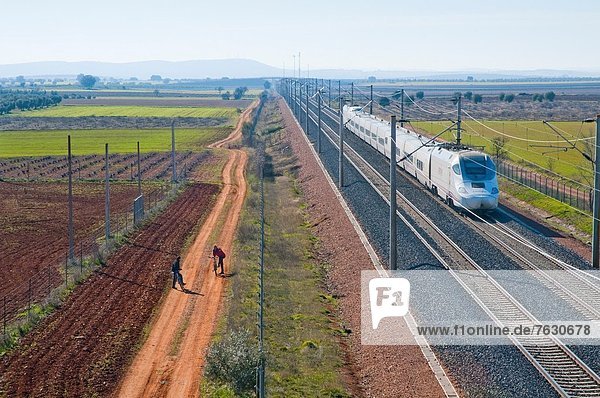 High-speed train travelling along La Mancha. Ciudad Real province  Castilla La Mancha  Spain.
