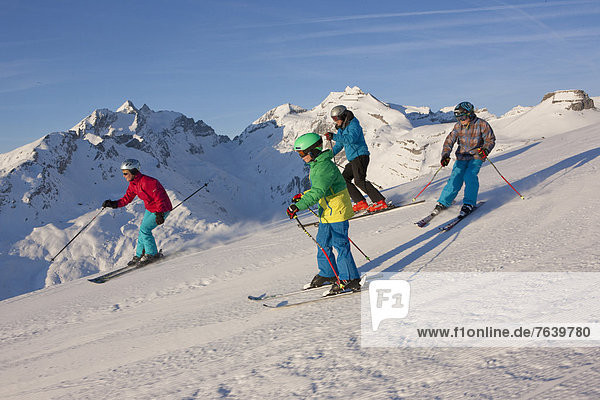 Family  skiing  winter sports  Brigels  mountain  mountains  family  ski  winter sports  Carving  Switzerland  Europe