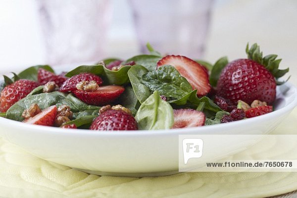 Spinach and Strawberry Salad with Walnuts and Cranberries