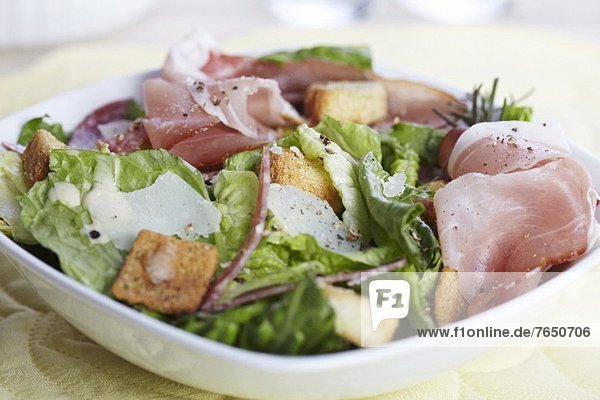 'Salad with Prosciutto  Shaved Parmesan and Croutons