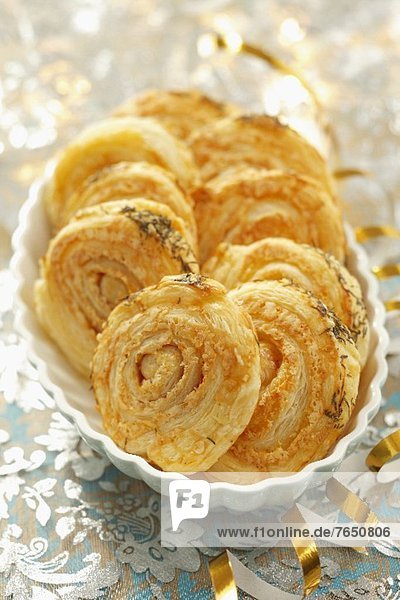 Puff pastries with salami and cheese