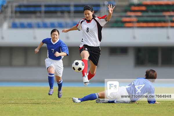 Women Playing Soccer