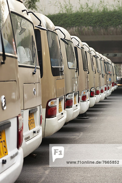 Beijing/row of vans
