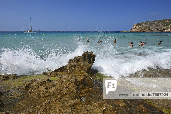 Tourists in the water  Cala Comte  Platges de Comte  Ibiza  Pitiusic Islands or Pine Islands  Balearic Islands  Spain  Europe