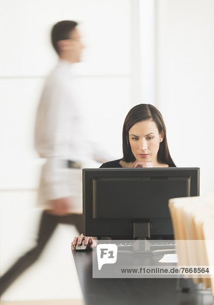 Office worker using computer