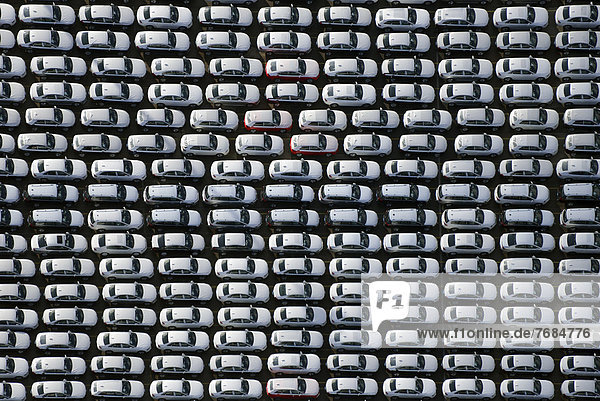 Aerial view  new cars waiting for transport  at UniKai terminal in the Port of Hamburg