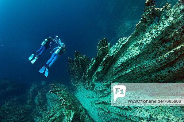 Scuba divers in Barracuda Lake