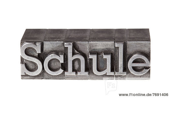 'Old lead letters forming the word ''Schule''  German for school'