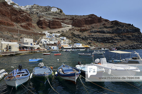 Fishing boats in the Ammoudi Harbour  Ammoudi Bay in Oia