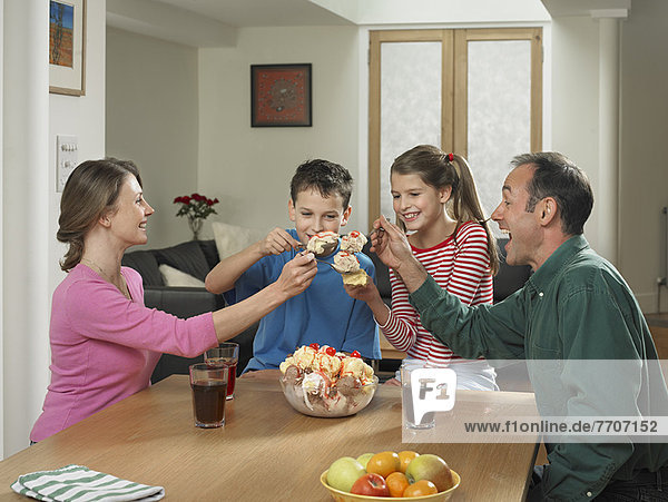 Family eating ice cream together