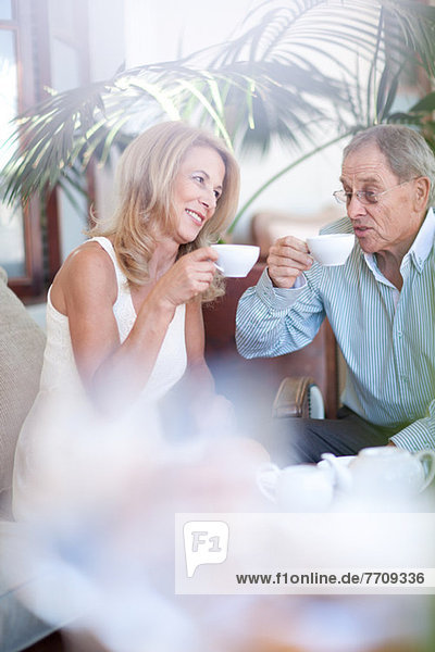 Older couple having coffee together