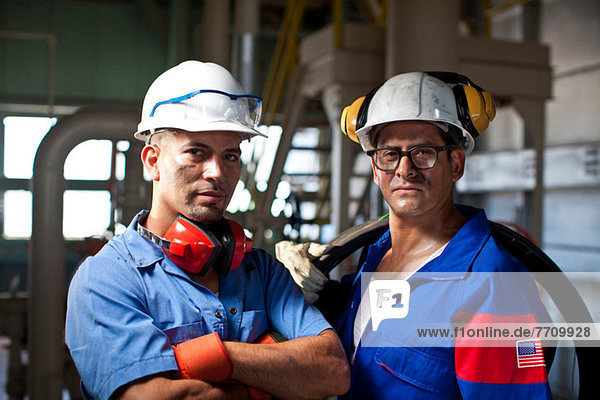 Industrial workers in plant