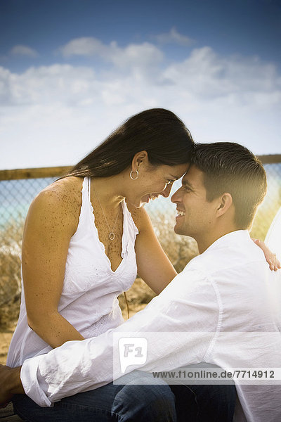 Happy Young Couple On A Beach  Encinitas California Usa