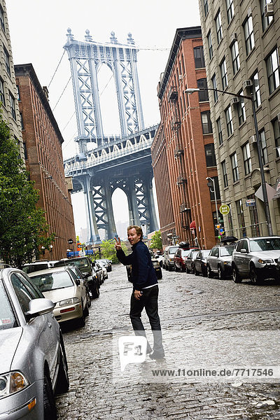 Young Man Near Brooklyn Bridge