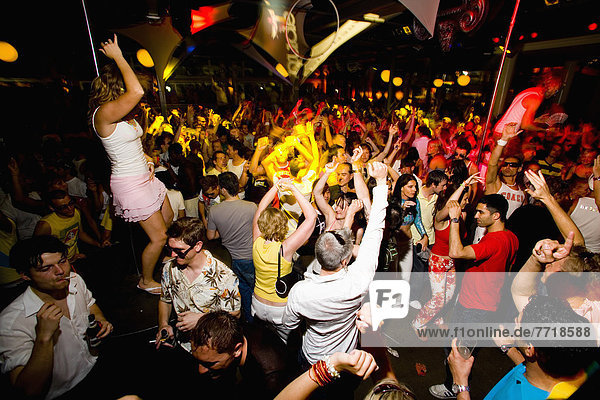 Dancing Clubbers In Nightclub